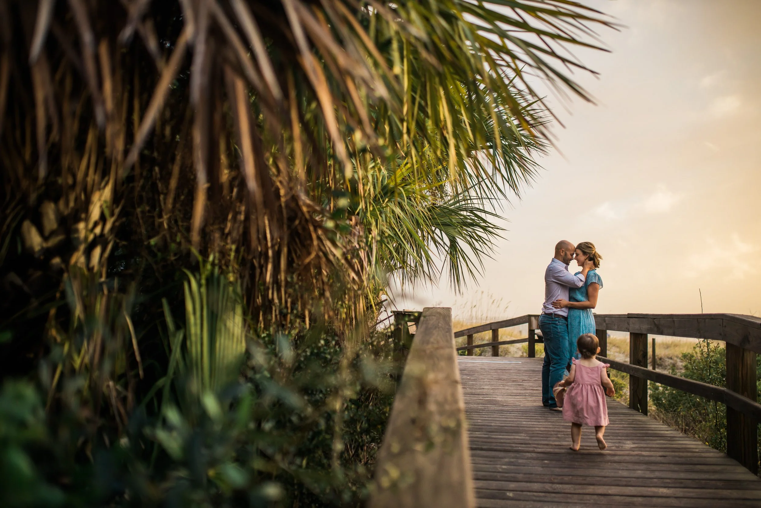 Family smiling together on Tybee Island